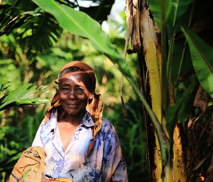 woman smiling in a forest