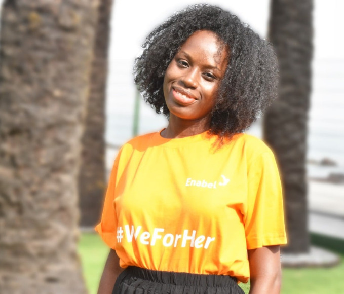 woman wearing a t-shirt with the hashtag #WeForHer