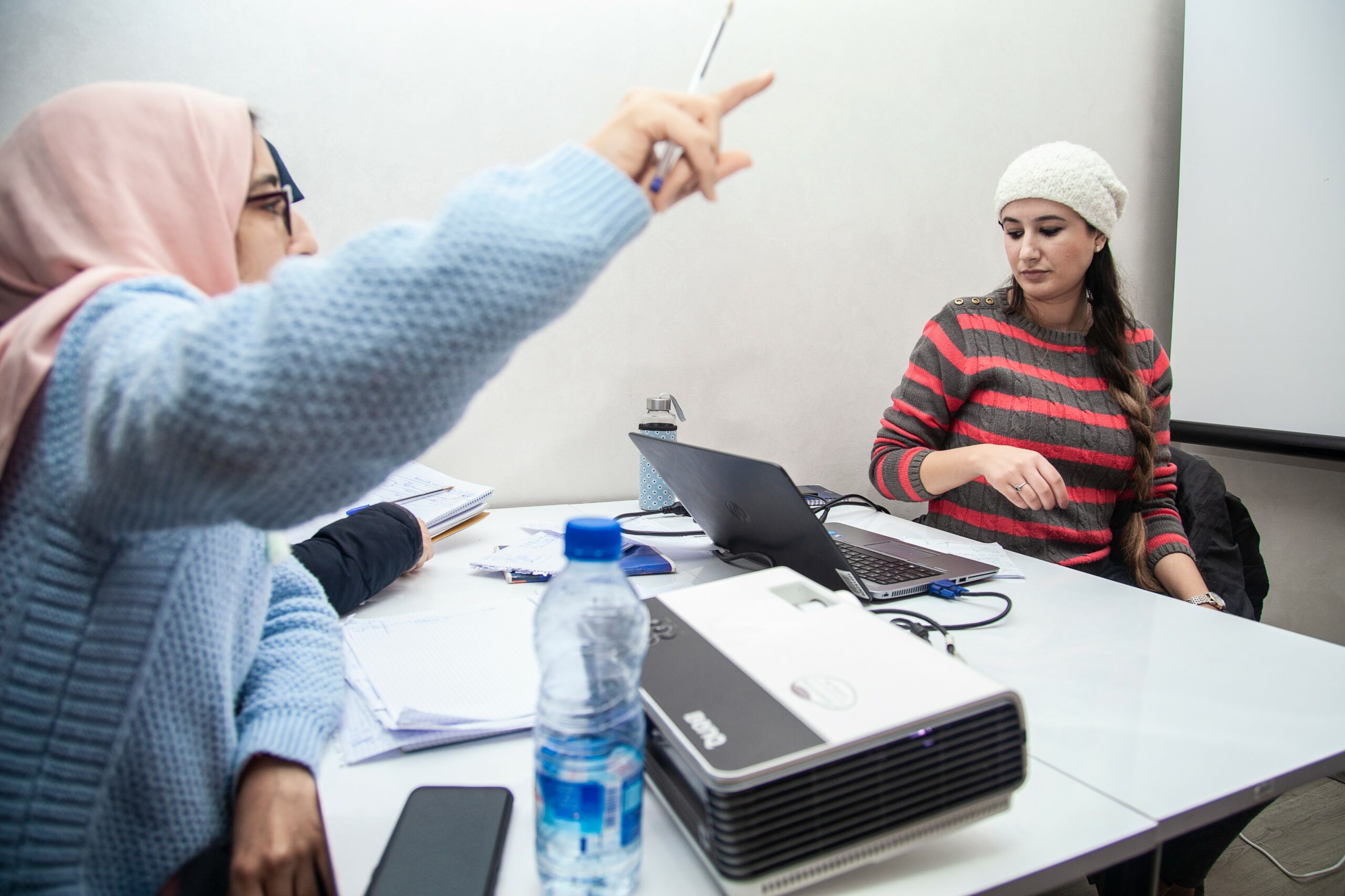 two women talking during a training