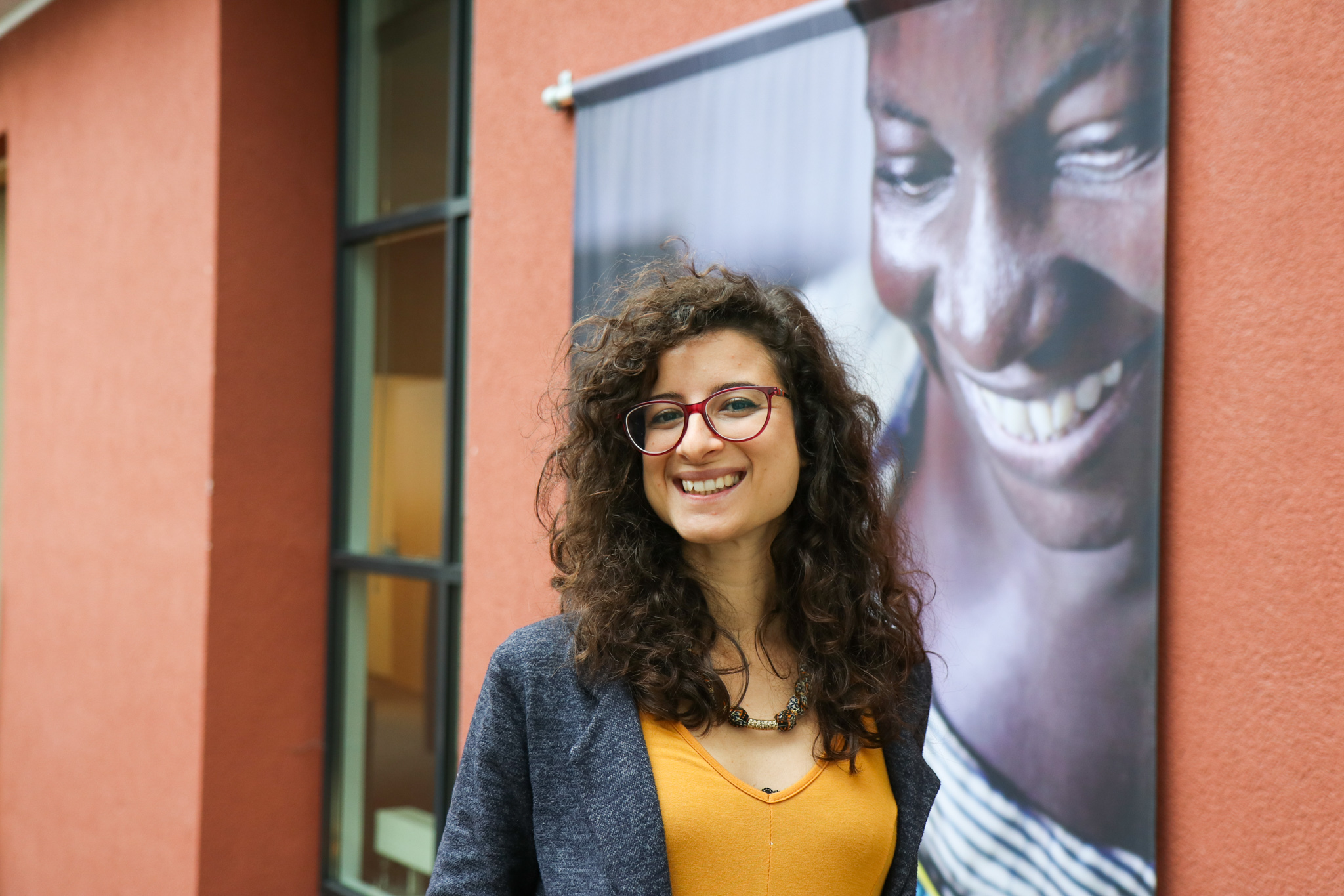 enabel employee smiling at the camera