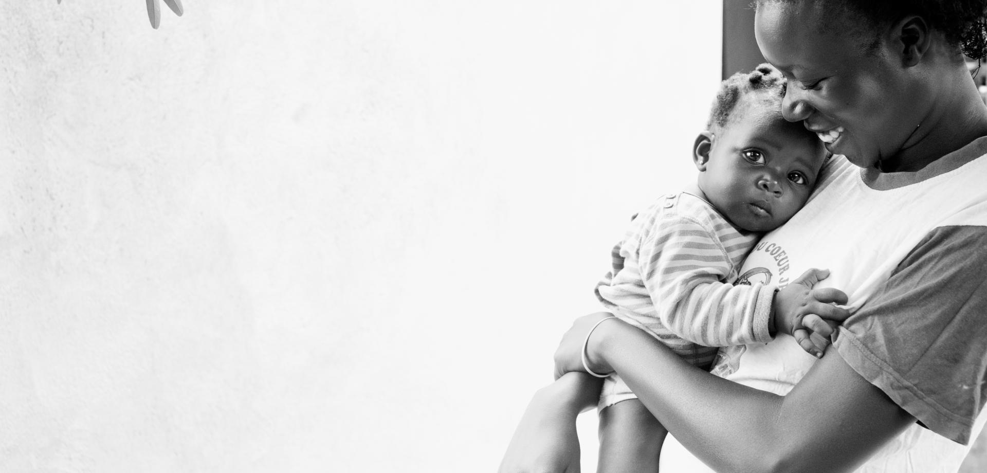 woman holding her baby